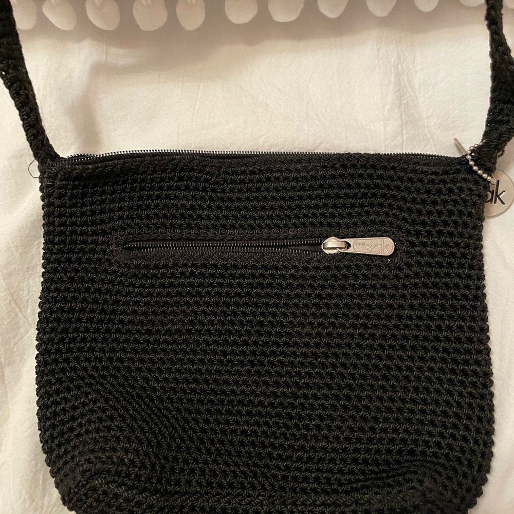 Cute small The Sak black crocheted bag